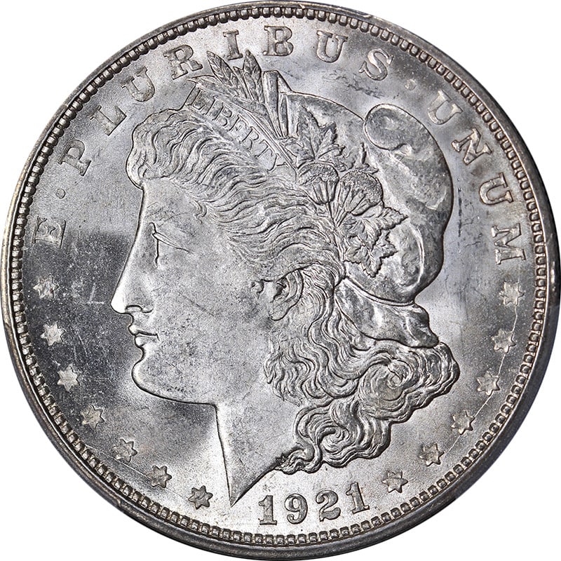 1921-D Morgan Silver Dollar PCGS MS64 Blast White Uncirculated: 1921-D Morgan Silver Dollar PCGS MS64 Blast White Uncirculated This 1921-D Morgan Silver Dollar is a remarkable collectible, renowned for its stunning blast white finish and exceptional eye appeal. Gr