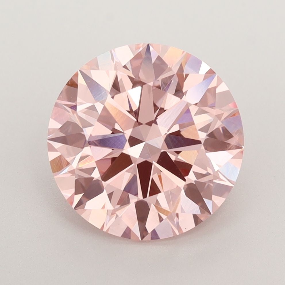 Ideal Loose Diamond - ROUND 3.4ct Fancy Vivid Pink VS1: Ideal Loose Diamond - ROUND 3.4ct Fancy Vivid Pink VS1 Source: This is a real non-mined Diamond that has been grown in a lab Shape: ROUND Carats: 3.4 Color: Fancy Vivid Pink Certification: IGI Video: