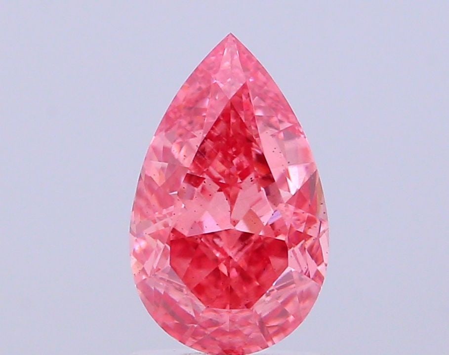 Loose Diamond - PEAR 2.13ct Fancy Vivid Pink SI1: Loose Diamond - PEAR 2.13ct Fancy Vivid Pink SI1 Source: This is a real non-mined Diamond that has been grown in a lab Shape: PEAR Carats: 2.13 Color: Fancy Vivid Pink Certification: IGI Additional