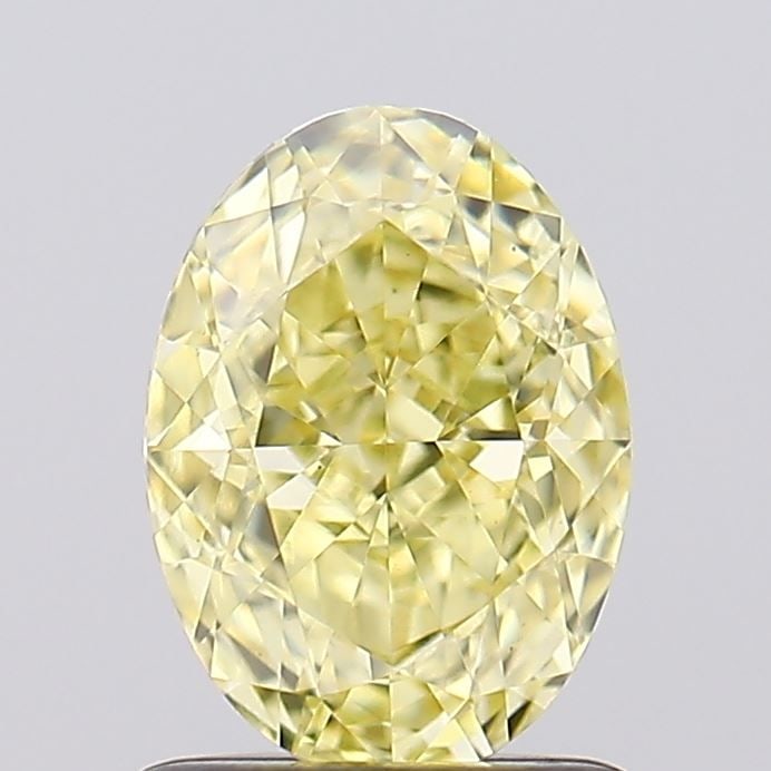 Loose Diamond - OVAL 1.32ct Fancy Vivid Yellow VS1: Loose Diamond - OVAL 1.32ct Fancy Vivid Yellow VS1 Source: This is a real non-mined Diamond that has been grown in a lab Shape: OVAL Carats: 1.32 Color: Fancy Vivid Yellow Certification: IGI Video: