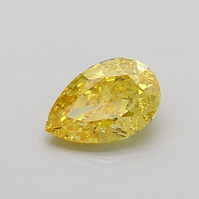 Loose Diamond - PEAR 1.08ct Fancy Vivid Yellow VS2: Loose Diamond - PEAR 1.08ct Fancy Vivid Yellow VS2 Source: This is a real non-mined Diamond that has been grown in a lab Shape: PEAR Carats: 1.08 Color: Fancy Vivid Yellow Certification: IGI Video: