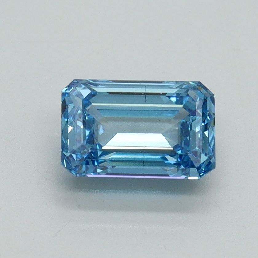 Loose Diamond - EMERALD 1.0ct Fancy Vivid Blue VS2: Loose Diamond - EMERALD 1.0ct Fancy Vivid Blue VS2 Source: This is a real non-mined Diamond that has been grown in a lab Shape: EMERALD Carats: 1.0 Color: Fancy Vivid Blue Certification: IGI Video: