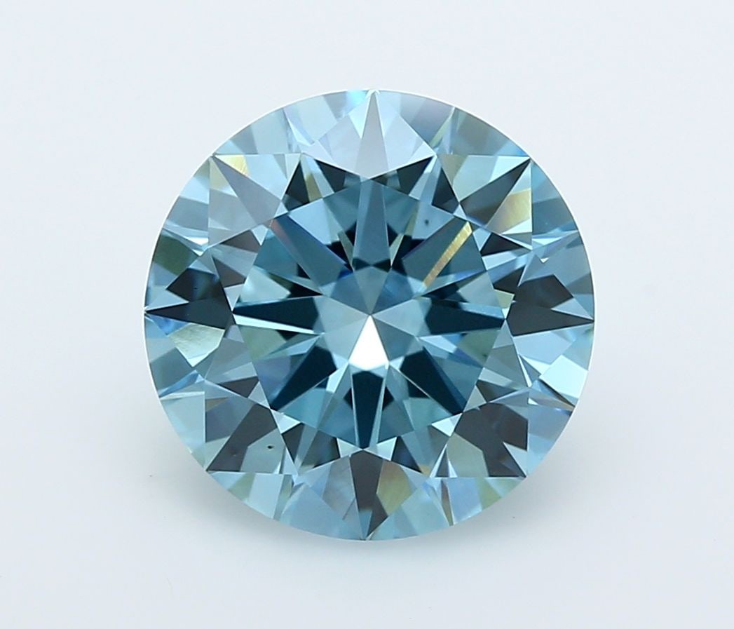Ideal Loose Diamond - ROUND 5.03ct Fancy Vivid Blue VVS2: Ideal Loose Diamond - ROUND 5.03ct Fancy Vivid Blue VVS2 Source: This is a real non-mined Diamond that has been grown in a lab Shape: ROUND Carats: 5.03 Color: Fancy Vivid Blue Certification: IGI Vide