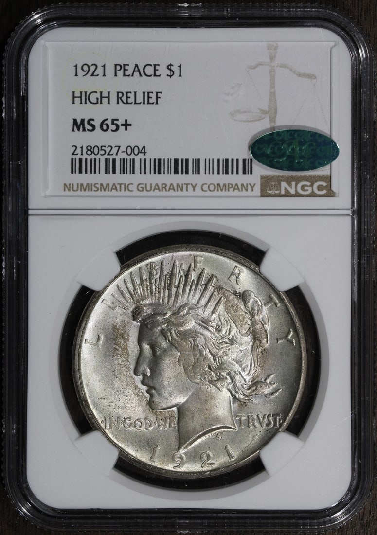 1921 Peace Silver Dollar High Relief MS65 Plus CAC NGC Certified: 1921 Peace Silver Dollar High Relief MS65 Plus CAC NGC Certified This is a 1921 High Relief Peace Silver Dollar graded MS65+ by NGC with CAC certification. Struck in Philadelphia, this uncirculated co