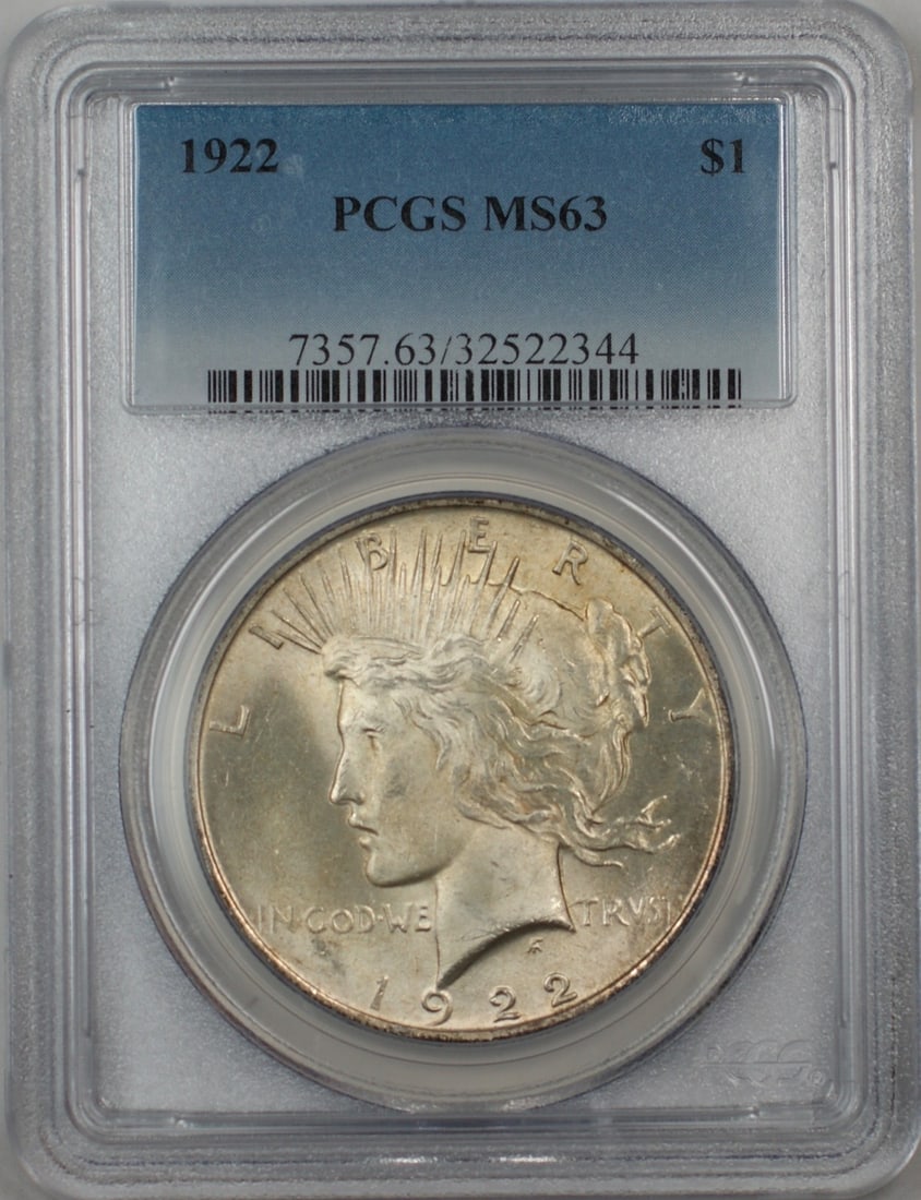 1922 Peace Dollar Silver Coin Lightly Toned ANACS MS 63 Philadelphia Mint: 1922 Peace Dollar Silver Coin Lightly Toned ANACS MS 63 Philadelphia Mint This 1922 Silver Peace Dollar features light toning and has been graded MS 63. Minted in Philadelphia, the coin is composed of