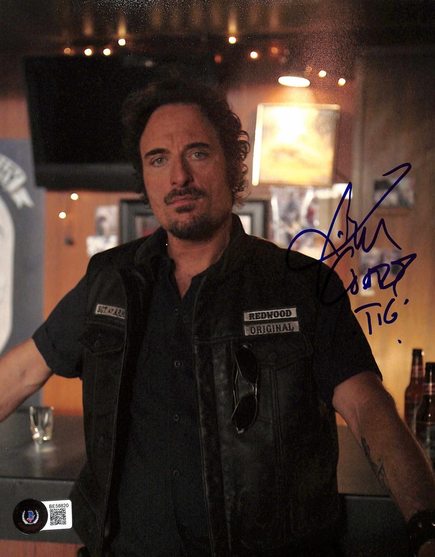 Kim Coates Signed 8x10 Photo Tig Trager Sons of Anarchy Beckett Authenticated: Kim Coates Signed 8x10 Photo Tig Trager Sons of Anarchy Beckett Authenticated This is an autographed 8x10 photograph of Kim Coates, known for his role as "Tig Trager" in the hit series Sons of Anarchy
