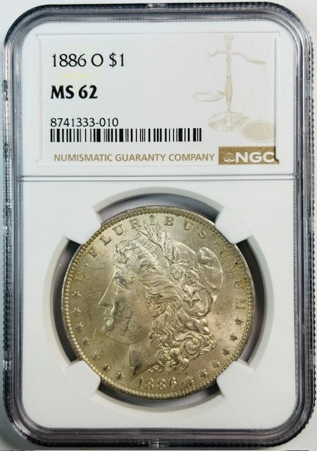 NGC Graded MS-62 1886 New Orleans Morgan Dollar Silver Coin: NGC Graded MS-62 1886 New Orleans Morgan Dollar Silver Coin This 1886 O Morgan Silver Dollar is certified by NGC with a grade of MS 62, indicating it is in uncirculated condition. Minted in New Orlean