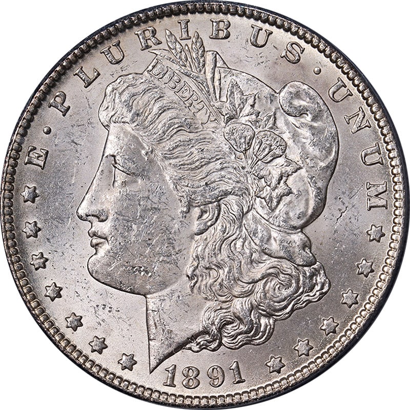 1891-CC Morgan Silver Dollar PCGS MS61 Blast White Uncirculated Coin: 1891-CC Morgan Silver Dollar PCGS MS61 Blast White Uncirculated Coin This stunning 1891-CC Morgan Silver Dollar is certified by PCGS with a grade of MS61. It features excellent luster and a strong str