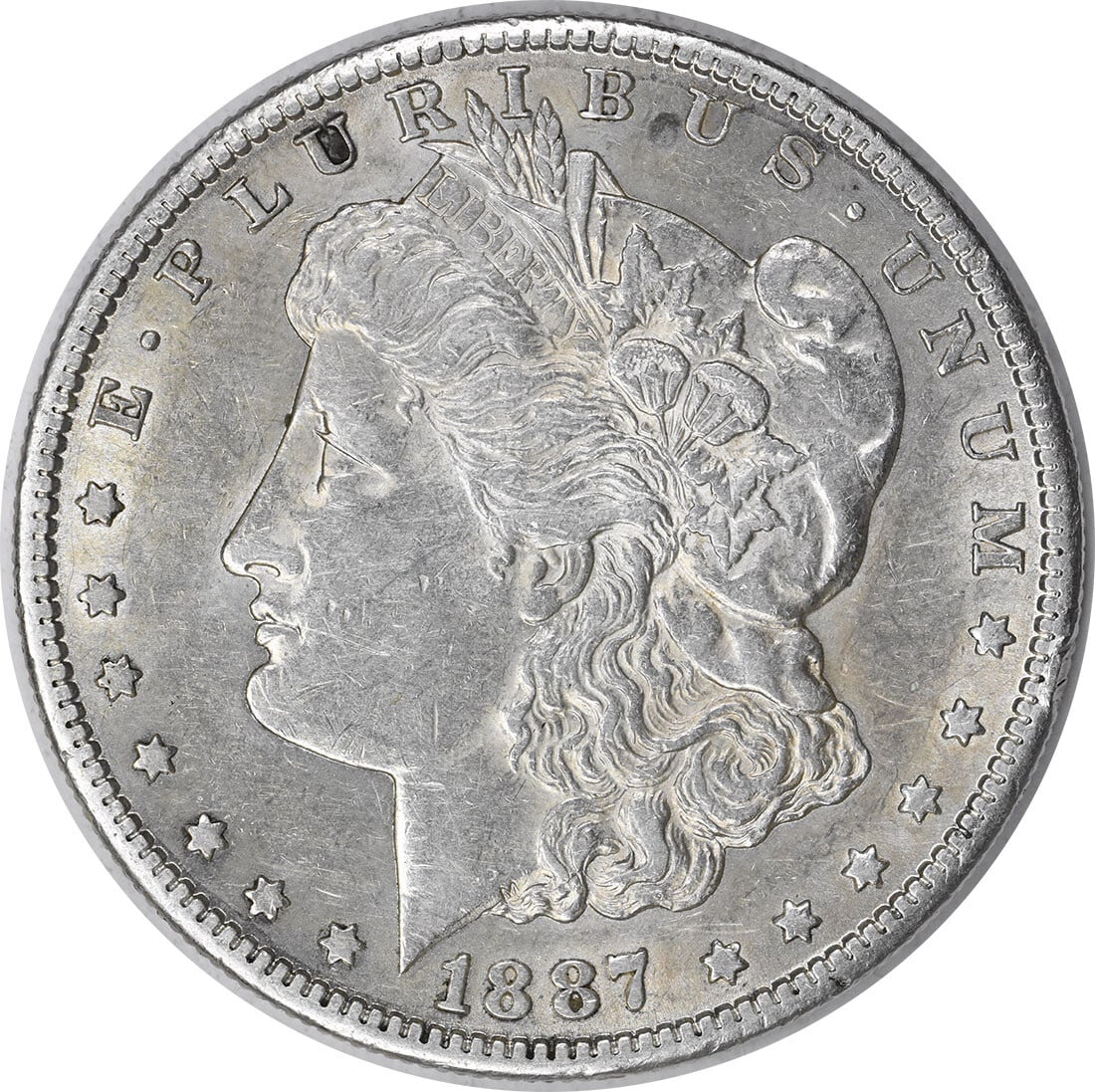 1887-S Morgan Silver Dollar AU Uncertified San Francisco Mint: 1887-S Morgan Silver Dollar AU Uncertified San Francisco Mint This 1887-S Morgan Silver Dollar is a remarkable piece of history, showcasing the artistry of designer George T. Morgan. Made from 90% sil