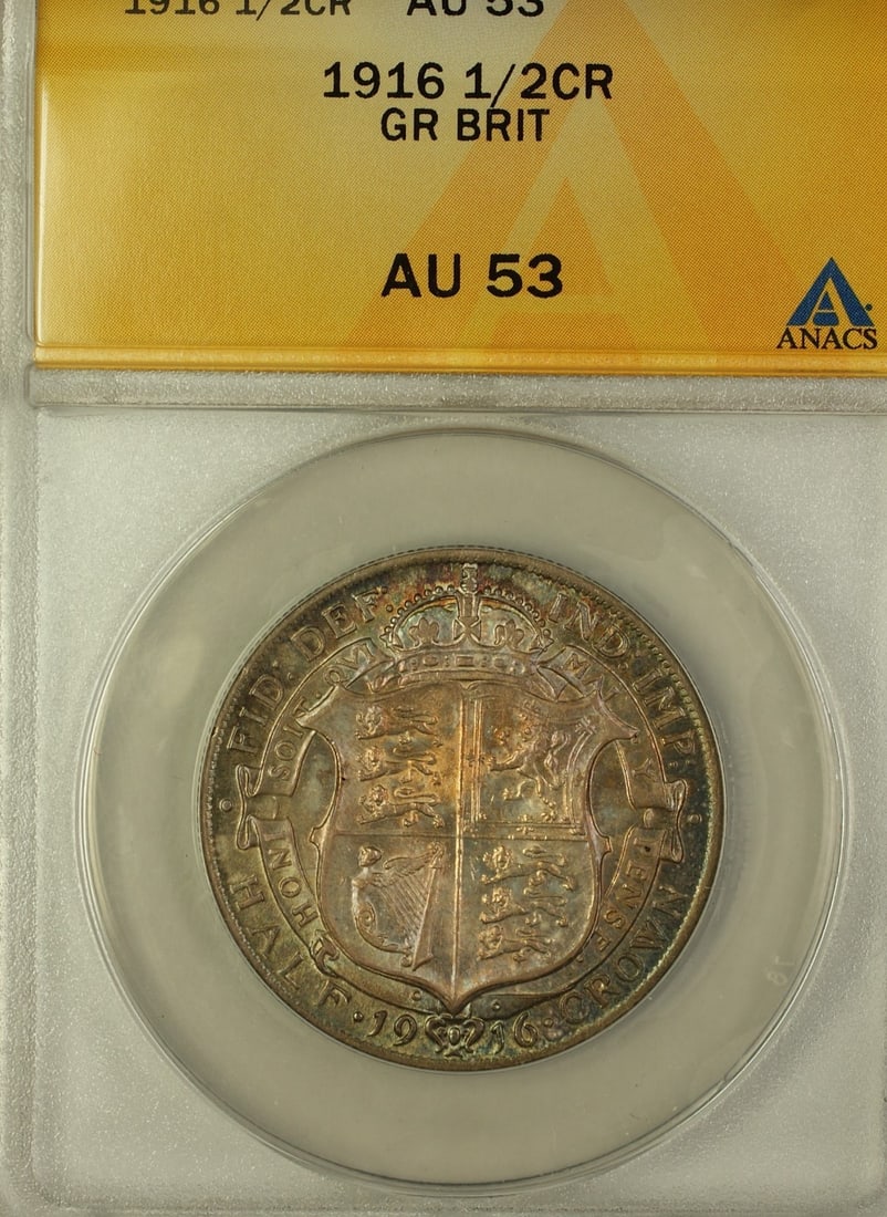 ANACS AU 53 1916 England Half Crown Silver Coin with Colorful Toning: ANACS AU 53 1916 England Half Crown Silver Coin with Colorful Toning This 1916 Great Britain Half Crown is a silver coin graded AU-53 by ANACS. The coin features beautiful pink and gold toning and is