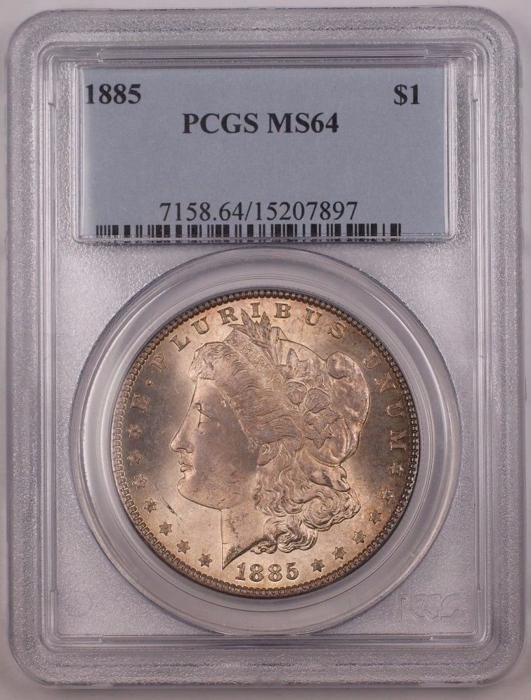 PCGS MS-64 1885 Morgan Silver Dollar Toned United States Coin: PCGS MS-64 1885 Morgan Silver Dollar Toned United States Coin This 1885 US Morgan Silver Dollar is composed of silver and was minted in Philadelphia. It has been certified by PCGS with a grade of MS 6