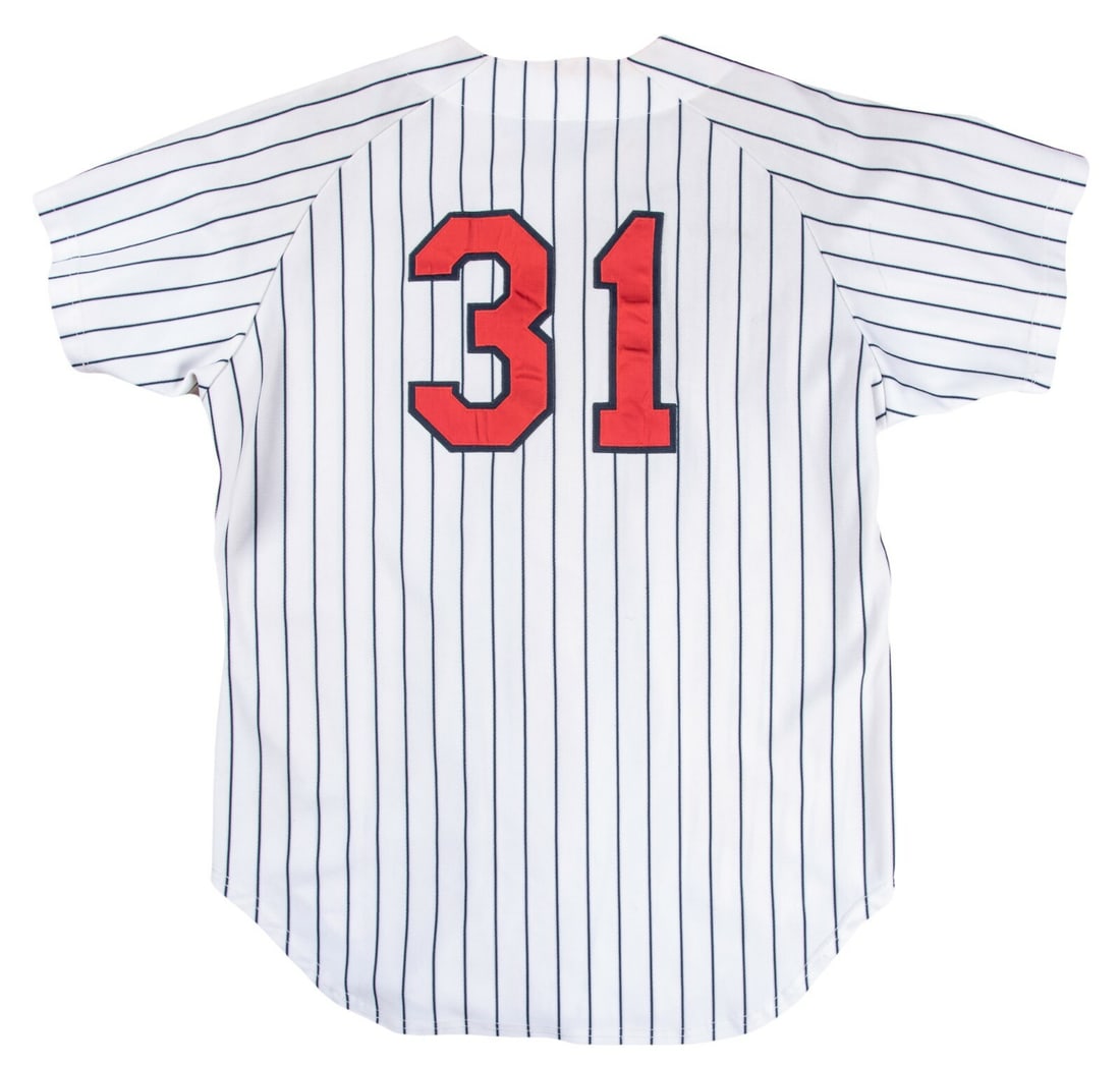 Derek Jeter 1993 Game Used Jersey Photo Matched Rookie Cards: Derek Jeter 1993 Game Used Jersey Photo Matched Rookie Cards Celebrate the legacy of Hall of Famer Derek Jeter with this exceptional piece of baseball history: his earliest known game-used jersey from