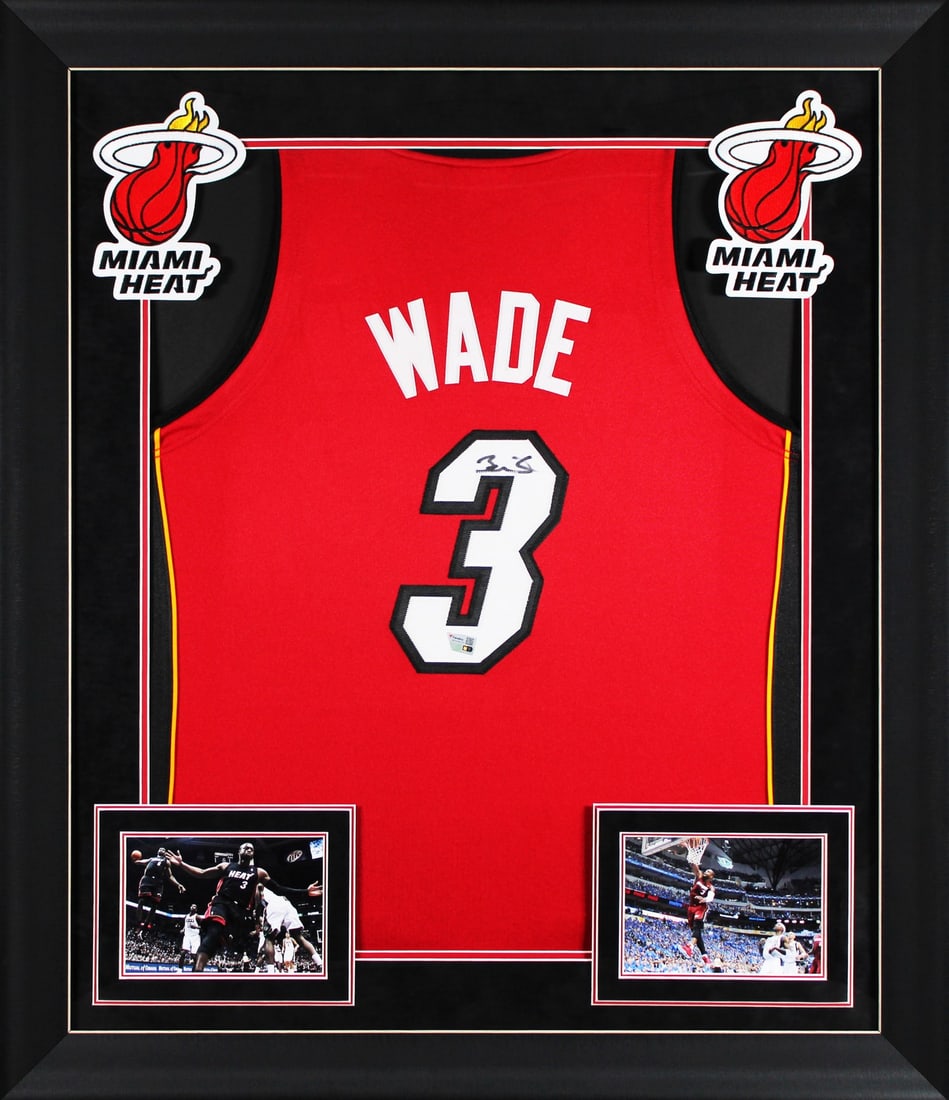 Dwyane Wade Signed 2005-06 Miami Heat Framed Jersey with Fanatics COA: Dwyane Wade Signed 2005-06 Miami Heat Framed Jersey with Fanatics COA Celebrate the legacy of Dwyane Wade with this original autographed 2005-06 Miami Heat red Mitchell & Ness authentic jersey.