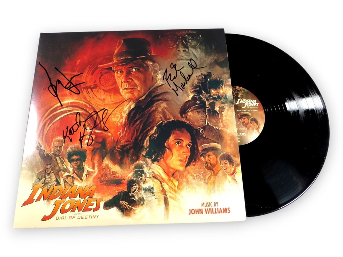 Indiana Jones Multi Autographed Album Cover Beckett Authenticated: Indiana Jones Multi Autographed Album Cover Beckett Authenticated This Indiana Jones Multi Autographed Album Cover is a collectible piece featuring the signatures of Harrison Ford, Kathleen Kennedy, a