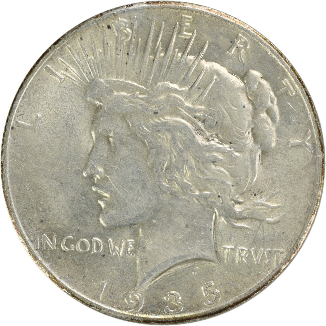 1935 Peace Silver Dollar AU Uncertified 90% Silver Coin: 1935 Peace Silver Dollar AU Uncertified 90% Silver Coin This 1935 Peace Silver Dollar, graded AU (About Uncirculated), showcases the artistry of designer Anthony de Francisci. Minted in Philadelphia,