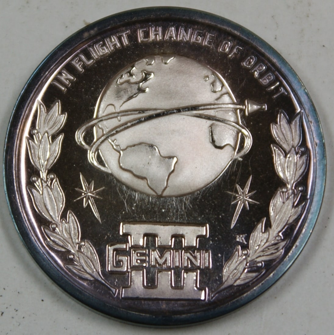 Silver Gemini 3 Medal Marking American Spaceflight Mission by International Mint: Silver Gemini 3 Medal Marking American Spaceflight Mission by International Mint This Gemini 3 commemorative silver medal celebrates the history of American men in space. The reverse side features the