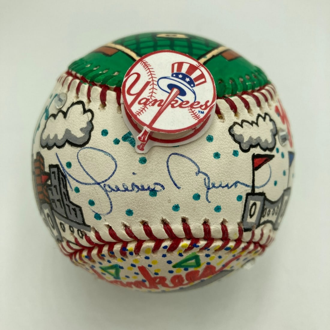 Mariano Rivera Autographed Charles Fazzino Pop Art Baseball with COA: Mariano Rivera Autographed Charles Fazzino Pop Art Baseball with COA This unique collectible features a Mariano Rivera autographed baseball, showcasing the artistry of Charles Fazzino. The Rawlings B.
