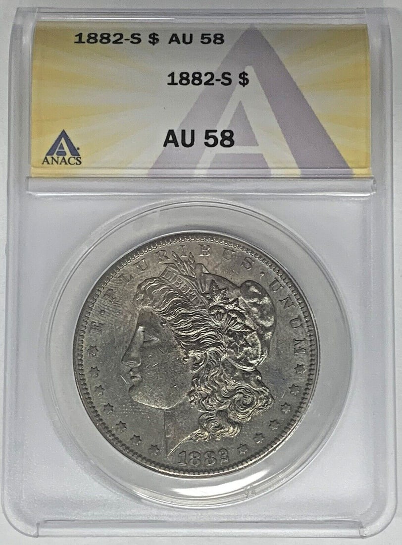 ANACS AU 58 1882-S Morgan Silver Dollar with Toning: ANACS AU 58 1882-S Morgan Silver Dollar with Toning This 1882-S Morgan Silver Dollar features a toned finish and is certified by ANACS with a grade of AU 58. Struck in silver, this uncirculated coin o