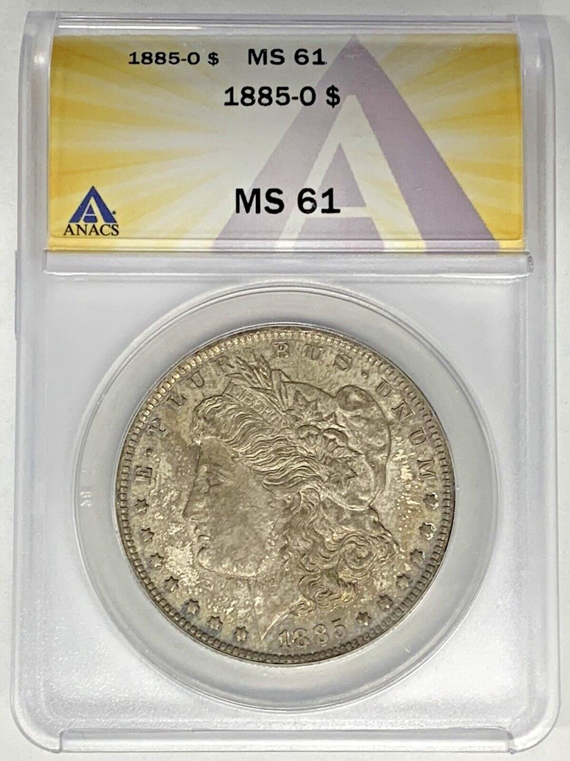 ANACS MS 61 1885-O Morgan Dollar Silver Coin with Attractive Toning: ANACS MS 61 1885-O Morgan Dollar Silver Coin with Attractive Toning This is an 1885-O Morgan Silver Dollar coin from the United States, featuring attractive toning. The coin is composed of silver, has