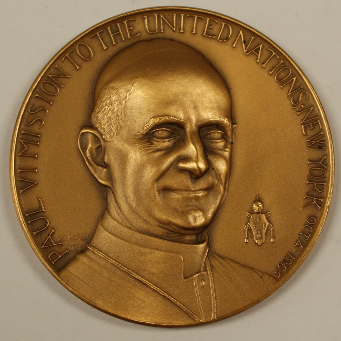 Bronze Medal Marking 1965 Pope Paul VI United Nations Visit With Facts: Bronze Medal Marking 1965 Pope Paul VI United Nations Visit With Facts This is a 1965 bronze medal commemorating Pope Paul VI's mission to the United Nations. The medal is uncirculated and originates
