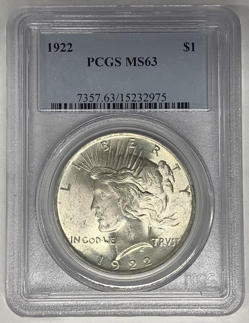 1922 Peace Dollar Silver Coin PCGS Graded MS 63 Uncirculated: 1922 Peace Dollar Silver Coin PCGS Graded MS 63 Uncirculated This is a 1922 Peace Silver Dollar coin from the United States, featuring a denomination of $1. The coin is composed of silver and has been