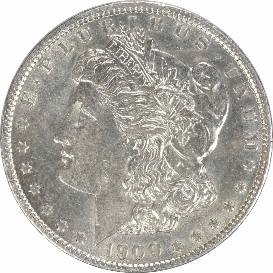 1900-O Morgan Silver Dollar AU Uncertified Coin by George T. Morgan: 1900-O Morgan Silver Dollar AU Uncertified Coin by George T. Morgan This 1900-O Morgan Silver Dollar features a beautiful design by George T. Morgan, showcasing the iconic Liberty head on the obverse