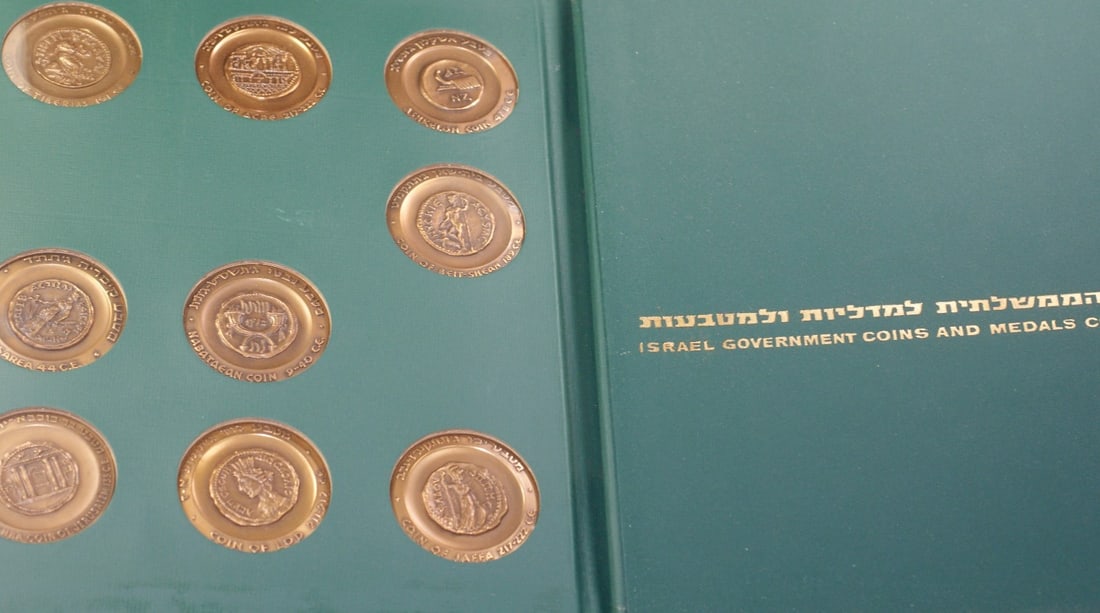 Set of 9 Bronze and 9 Sterling Silver Israeli City Medals by Government Corporation: Set of 9 Bronze and 9 Sterling Silver Israeli City Medals by Government Corporation This collection features nine medals issued by the Israel Government and Medals Corporation, with a combination of b