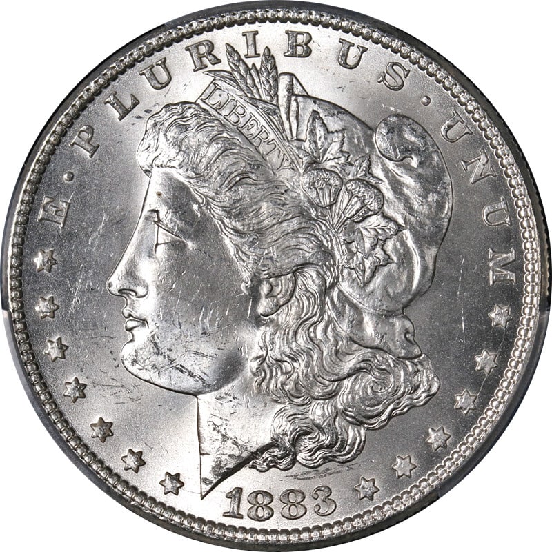 PCGS MS64 1883-P Morgan Silver Dollar with Excellent Luster and Strike: PCGS MS64 1883-P Morgan Silver Dollar with Excellent Luster and Strike This 1883-P Morgan Silver Dollar is certified by PCGS with an MS64 grade, indicating an uncirculated coin with superb eye appeal,