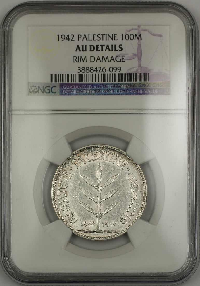 Palestine 1942 Silver 100 Mils NGC AU Details Rim Damage Coin: Palestine 1942 Silver 100 Mils NGC AU Details Rim Damage Coin This is a 1942 Palestine 100 Mils silver coin graded AU Details by NGC, featuring rim damage. The coin is composed of 72% silver and origi