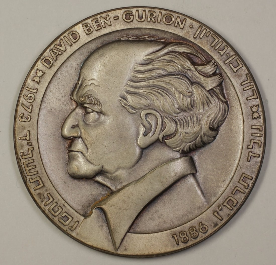 White Metal 1986 Ben-Gurion Commemorative Medal 89g 59mm: White Metal 1986 Ben-Gurion Commemorative Medal 89g 59mm This is a 1986 David Ben-Gurion medal crafted from white metal. The medal weighs 89 grams and measures 59 mm in diameter. It is a pre-owned col