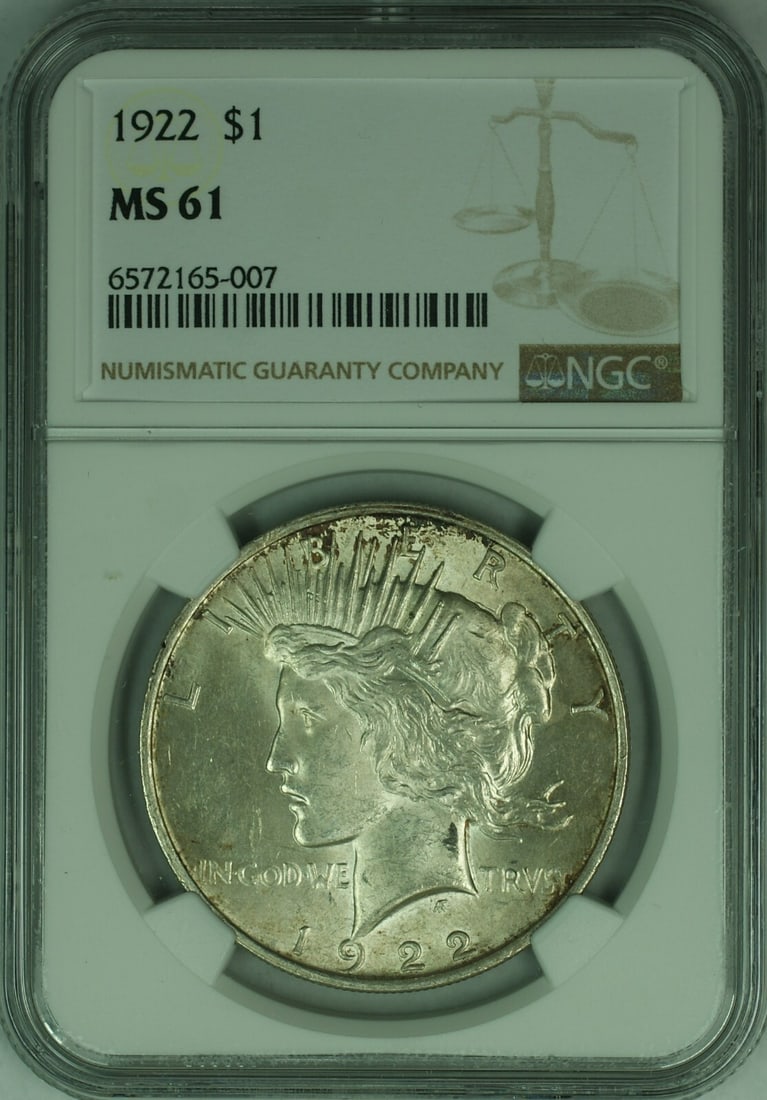 1922 Peace Dollar Silver NGC MS61 Uncirculated Toned Philadelphia Mint: 1922 Peace Dollar Silver NGC MS61 Uncirculated Toned Philadelphia Mint This is a 1922 Peace Silver Dollar graded MS-61 by NGC. The coin was minted in Philadelphia and features natural toning. It is co