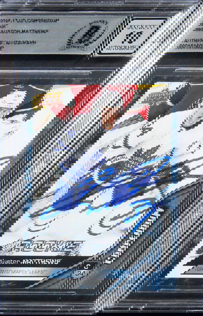 Auston Matthews 2016 UD Compendium Blue RC Card Auto 10 Beckett Authenticated: Auston Matthews 2016 UD Compendium Blue RC Card Auto 10 Beckett Authenticated This is a 2016 Upper Deck Compendium Blue #900 rookie card of Auston Matthews, personally signed by the Toronto Maple Leaf