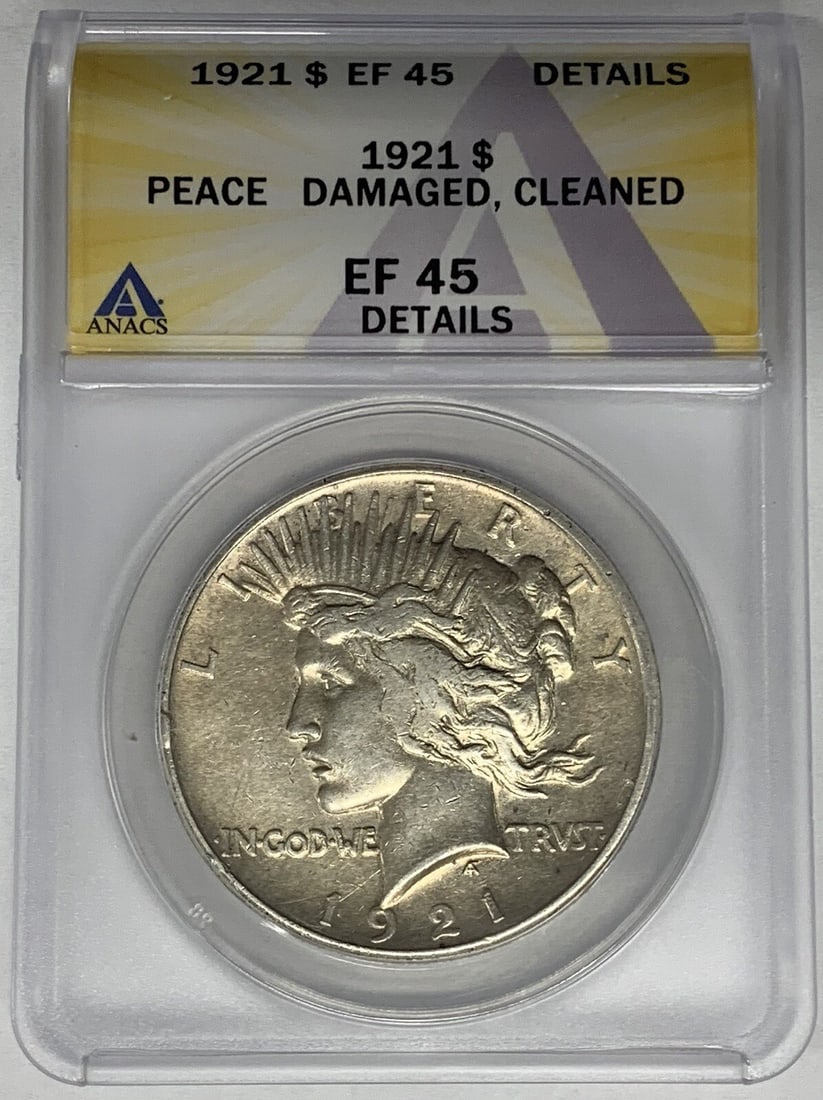 ANACS Certified 1921 Peace Dollar Silver Coin XF 45 Damaged Cleaned: ANACS Certified 1921 Peace Dollar Silver Coin XF 45 Damaged Cleaned This is a 1921 Peace Silver Dollar coin from the United States, certified by ANACS with a grade of XF 45. The coin is composed of si