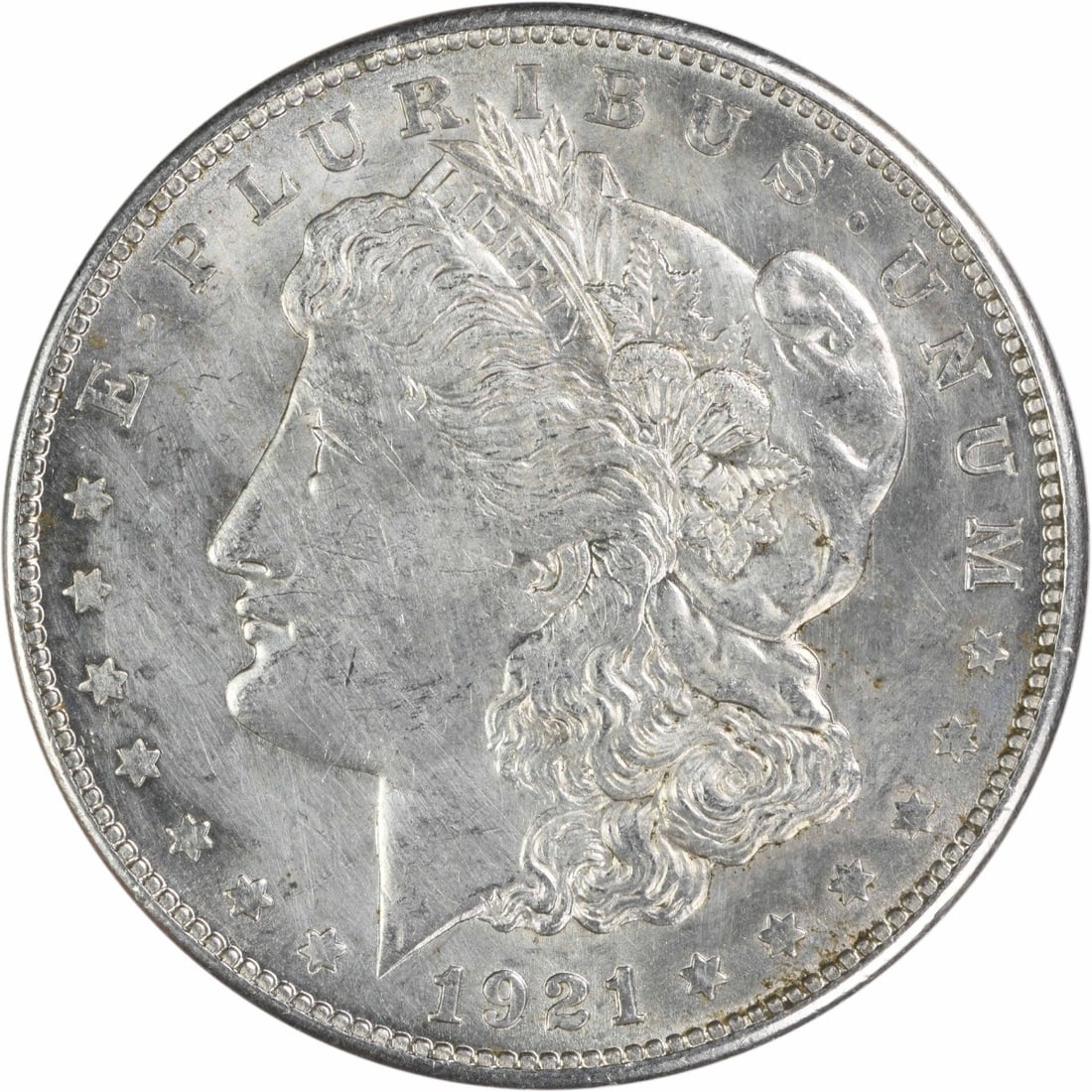 San Francisco 1921 Morgan Dollar 90% Silver AU Grade Uncertified: San Francisco 1921 Morgan Dollar 90% Silver AU Grade Uncertified This 1921-S Morgan Silver Dollar is an AU grade, circulated coin from the San Francisco Mint. Designed by George T. Morgan, it is compo