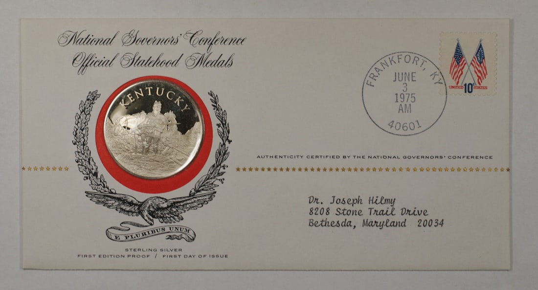 Kentucky 1975 Postmasters of America Sterling Silver Commemorative Medal: Kentucky 1975 Postmasters of America Sterling Silver Commemorative Medal This is a 1975 Postmasters of America commemorative medal honoring the State of Kentucky. Struck in sterling silver with a fine