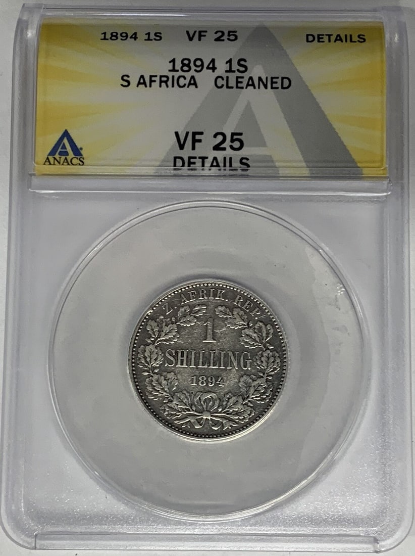 Silver 1894 South Africa One Shilling Coin ANACS VF 25 Cleaned: Silver 1894 South Africa One Shilling Coin ANACS VF 25 Cleaned This 1894 South Africa 1 Shilling coin is composed of silver and has been certified by ANACS with a VF 25 grade. The coin has been cleane
