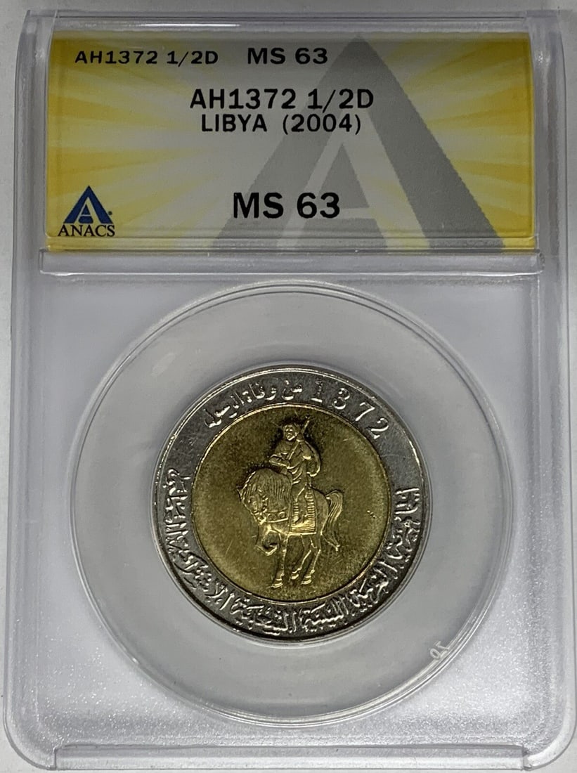 Libya 2004 Half Dinar ANACS MS 63 Certified Coin AH1372: Libya 2004 Half Dinar ANACS MS 63 Certified Coin AH1372 This is a 2004 Libya Half Dinar coin, certified by ANACS with a grade of MS 63. The coin is uncirculated and features the AH1372 date marking. I