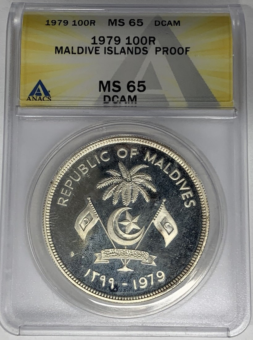 ANACS PR 65 DCAM 1979 Maldives Proof 100 Rupee Coin: ANACS PR 65 DCAM 1979 Maldives Proof 100 Rupee Coin This is a 1979 Maldive Islands proof 100 rupee coin graded PR 65 DCAM by ANACS. The coin is uncirculated and comes from the Maldives, retaining its