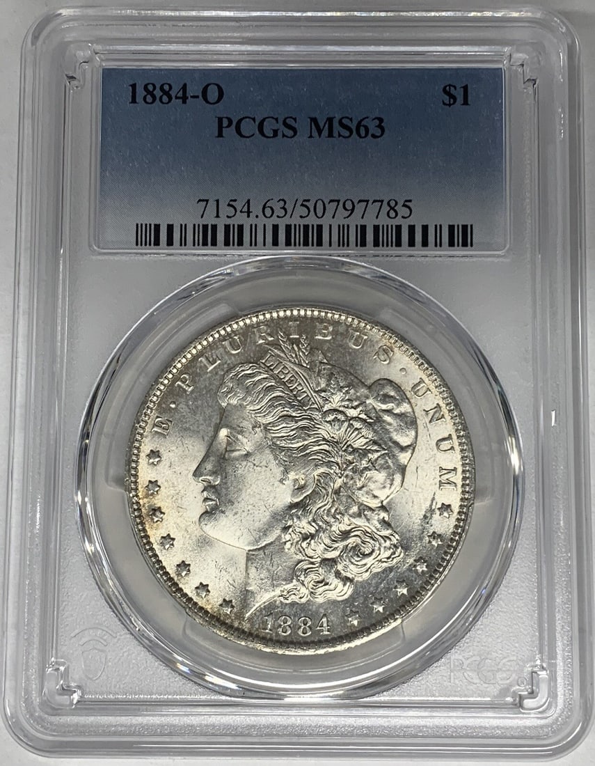 PCGS MS 63 1884-O Morgan Silver Dollar Uncirculated US Coin: PCGS MS 63 1884-O Morgan Silver Dollar Uncirculated US Coin This is an 1884-O Morgan Silver Dollar coin graded MS 63 by PCGS. The coin is uncirculated and features the classic Morgan design. Certified