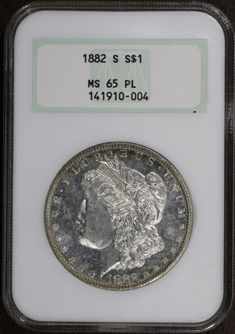 1882-S Morgan Silver Dollar MS65PL NGC Fatty Stunning Prooflike: 1882-S Morgan Silver Dollar MS65PL NGC Fatty Stunning Prooflike This stunning 1882-S Morgan Silver Dollar is graded MS65PL by NGC, showcasing its premium quality and brilliant luster. As an uncirculat