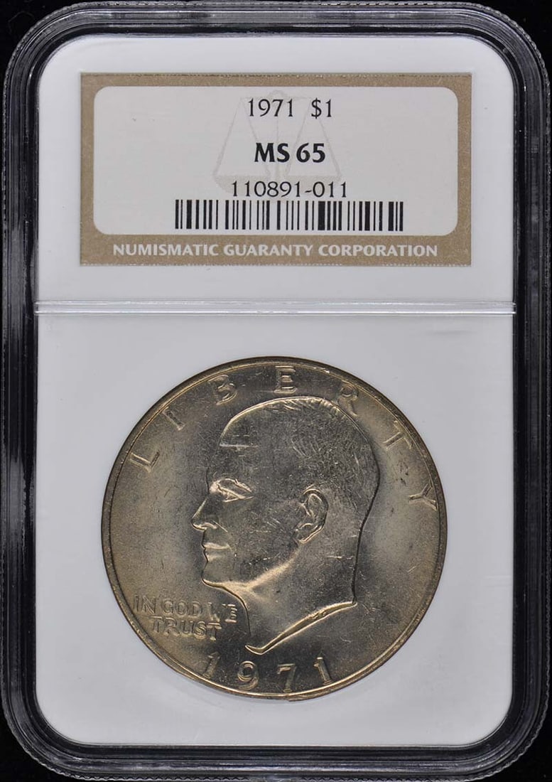 1971 NGC MS65 Eisenhower Dollar Uncirculated Coin: 1971 NGC MS65 Eisenhower Dollar Uncirculated Coin This 1971 Eisenhower Dollar, graded MS65 by NGC, is a remarkable addition to any coin collection. This uncirculated coin showcases the impressive deta