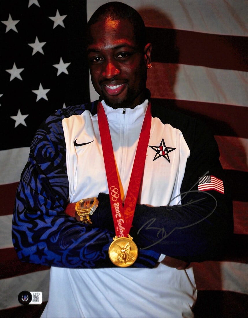 11x14 Photo Signed by Dwyane Wade 2008 Olympic Gold Beckett Authenticated: 11x14 Photo Signed by Dwyane Wade 2008 Olympic Gold Beckett Authenticated This is an original 11x14 photograph signed by Dwayne Wade, a member of the 2008 Olympic Gold Medal basketball team. The autog