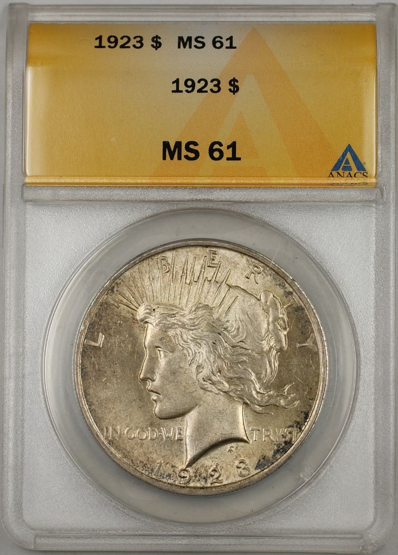 ANACS MS-61 1923 Peace Dollar Silver Coin Toned Uncirculated Philadelphia: ANACS MS-61 1923 Peace Dollar Silver Coin Toned Uncirculated Philadelphia This 1923 Peace Silver Dollar coin is certified by ANACS with a grade of MS-61. Struck in Philadelphia, it is composed of silv
