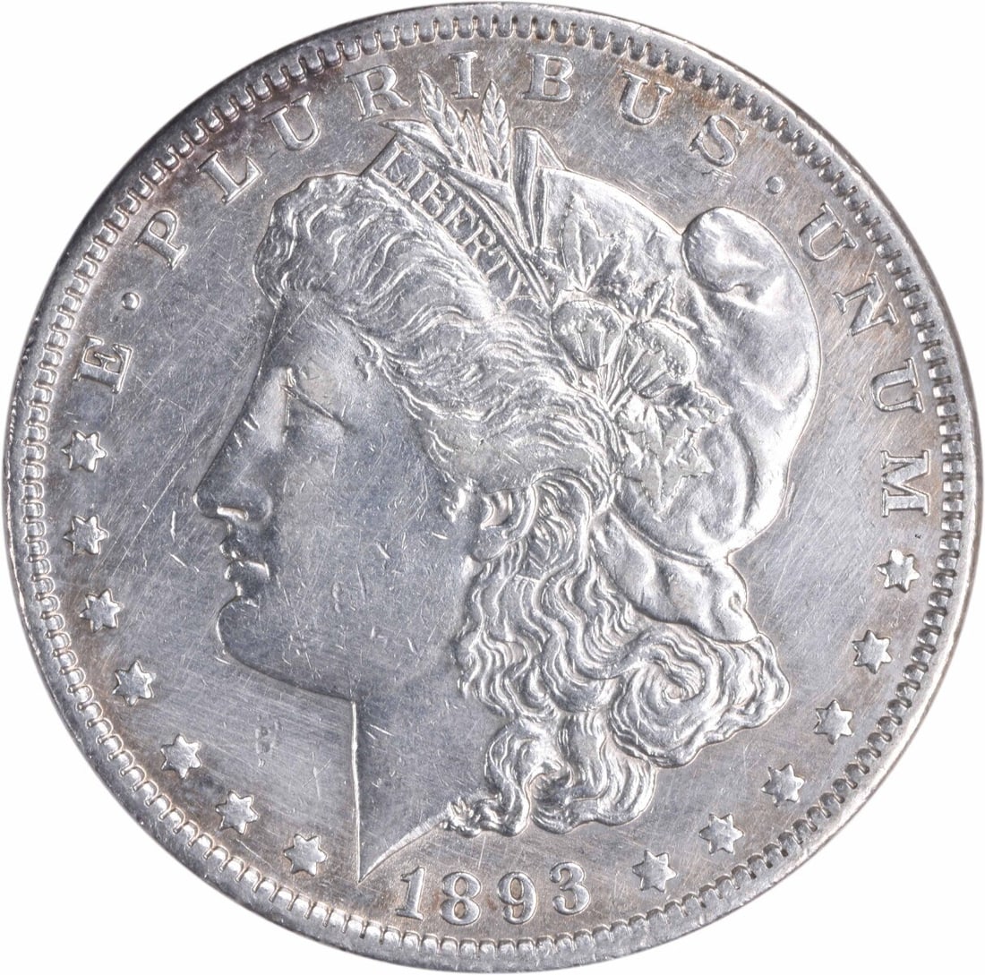 1893 Philadelphia Morgan Dollar AU Grade Uncertified 90 Percent Silver Coin: 1893 Philadelphia Morgan Dollar AU Grade Uncertified 90 Percent Silver Coin This 1893 Morgan Silver Dollar from the United States was minted in Philadelphia and features the design by George T. Morgan