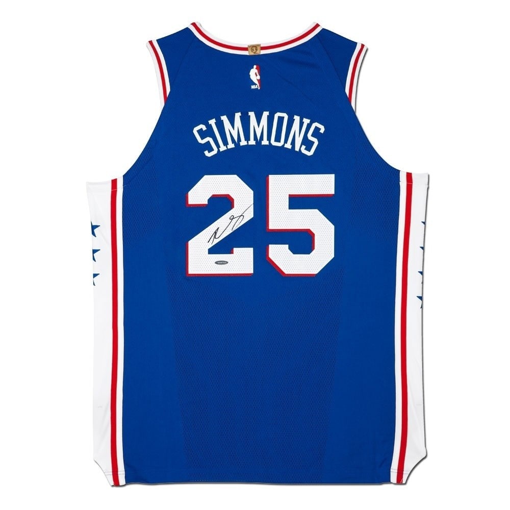 Ben Simmons Autographed Nike Jersey Philadelphia 76ers Upper Deck Certified: Ben Simmons Autographed Nike Jersey Philadelphia 76ers Upper Deck Certified This is an original, autographed Nike jersey of Ben Simmons, featuring the iconic blue design of the Philadelphia 76ers. The