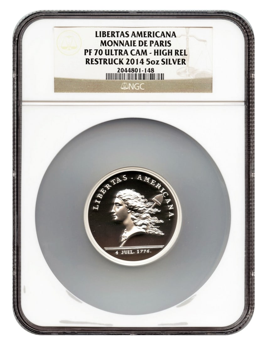 Libertas Americana 5 oz Silver Medal 2014 Restrike NGC PR70DCAM: Libertas Americana 5 oz Silver Medal 2014 Restrike NGC PR70DCAM This is a 2014 restrike of the Libertas Americana Medal, originally dated 1776. The medal is struck in 5 oz of silver and has been certi