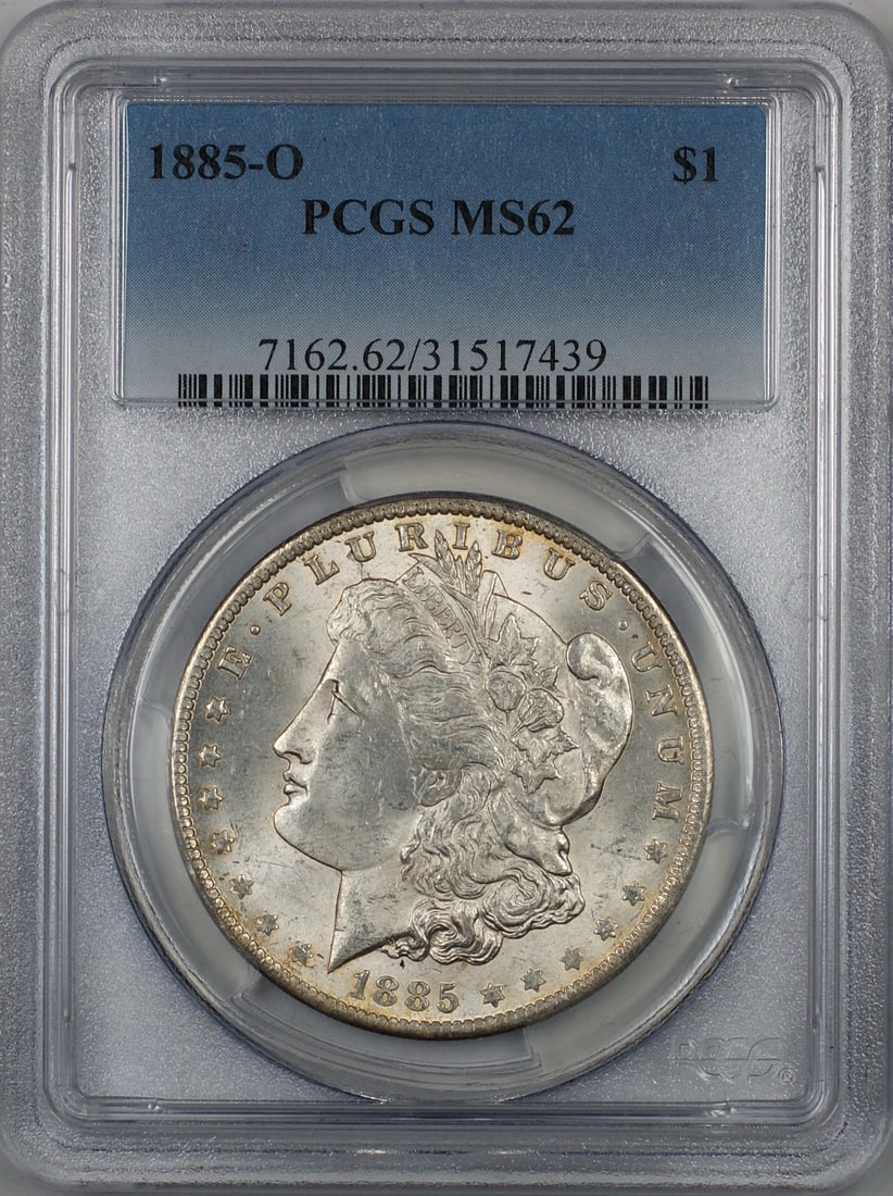 PCGS MS62 1885-O Morgan Dollar Silver Coin With Toned Reverse: PCGS MS62 1885-O Morgan Dollar Silver Coin With Toned Reverse This is an 1885-O Morgan Silver Dollar graded MS-62 by PCGS. The coin is uncirculated and features a toned reverse. It was minted in New O