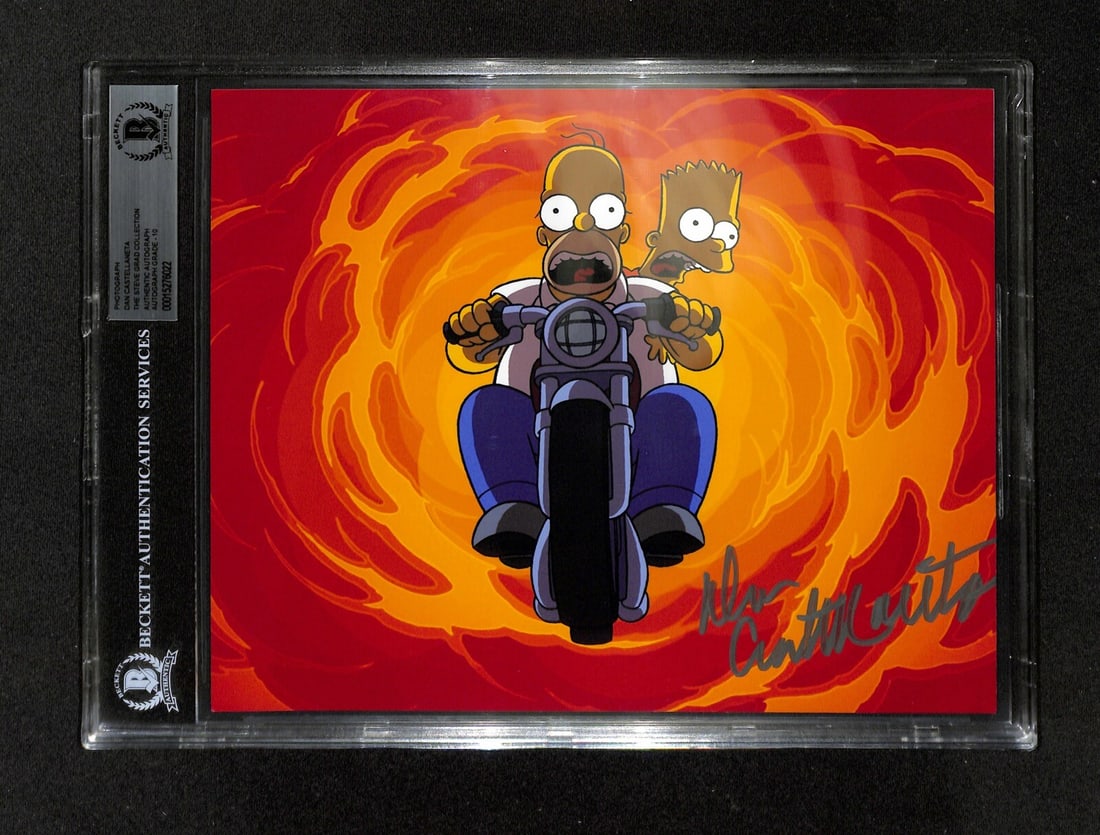 Beckett 10 Homer Simpson 8x10 Photo Signed by Dan Castellaneta: Beckett 10 Homer Simpson 8x10 Photo Signed by Dan Castellaneta This 8x10 color photograph features an authentic signature by Dan Castellaneta, the voice of Homer Simpson from the animated TV series Th