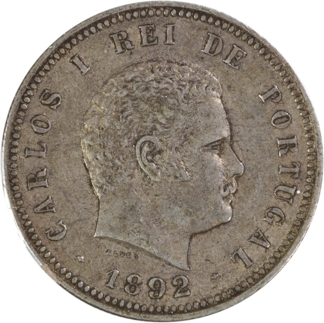 1892 Silver 200 Reis Coin Portugal KM534 Extra Fine Uncertified: 1892 Silver 200 Reis Coin Portugal KM534 Extra Fine Uncertified This 1892 Portugal 200 Reis coin is composed of silver and is in circulated condition. It is graded as Extremely Fine (EF) and is uncert