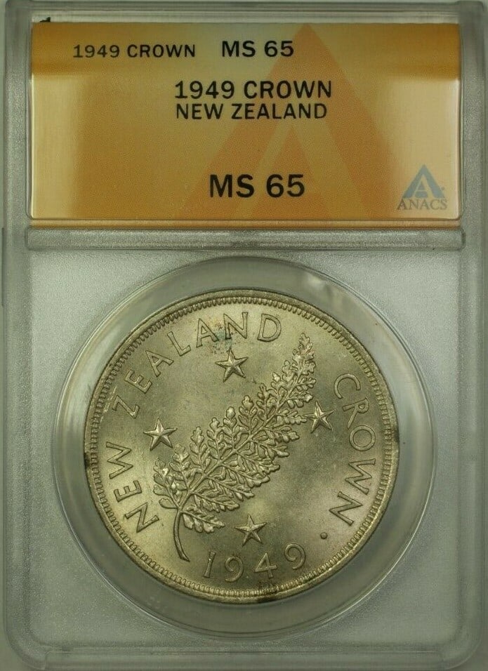 1949 New Zealand One Crown ANACS MS 65 Certified Coin: 1949 New Zealand One Crown ANACS MS 65 Certified Coin This is a 1949 New Zealand 1 Crown coin certified by ANACS with a grade of MS 65. The coin is pre-owned and features high-grade preservation. Spec